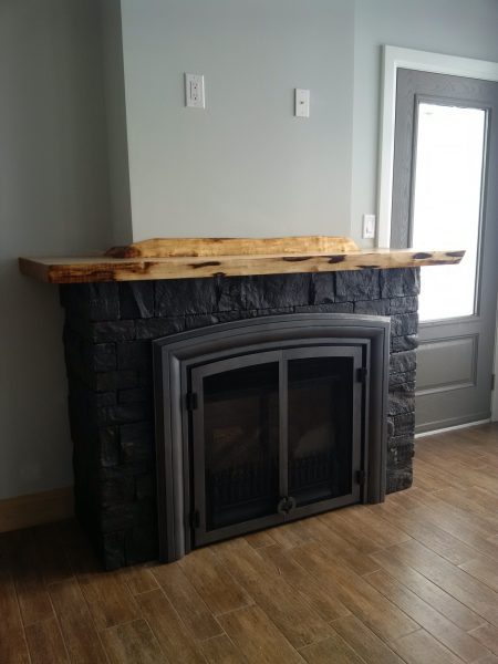 Interior photograph of the fireplace.